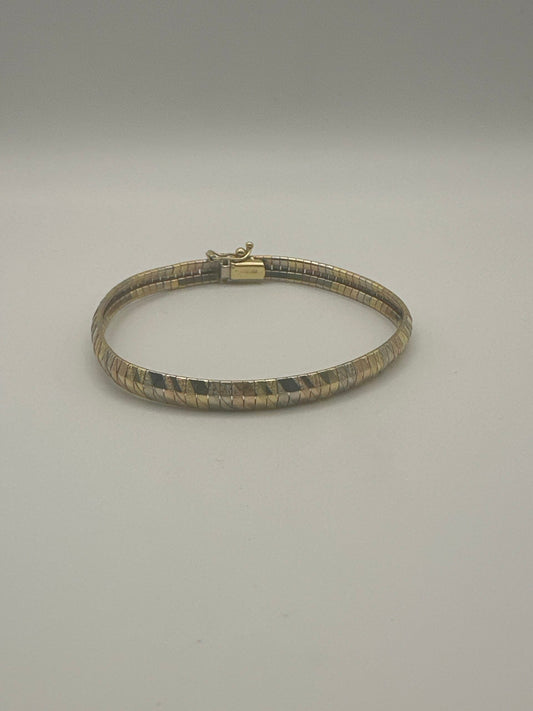 Bracelet en or jaune/blanc/rose 18 carats – d'occasion