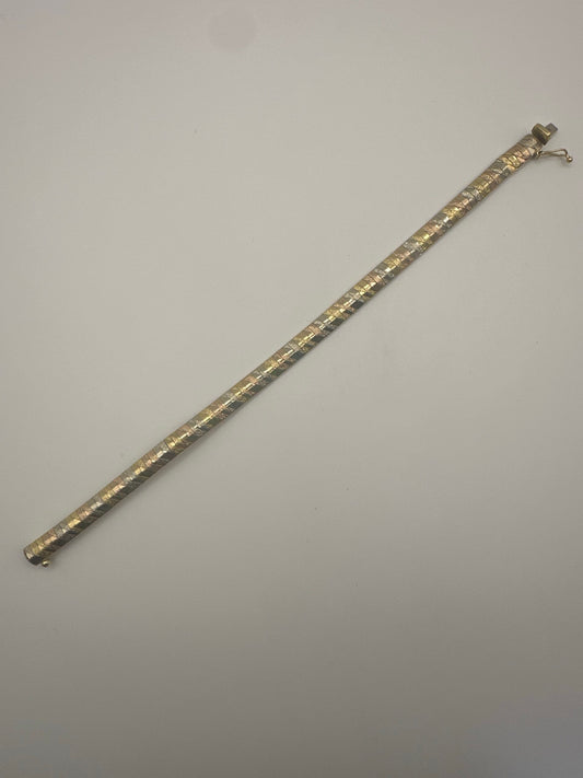 Bracelet en or jaune/blanc/rose 18 carats – d'occasion